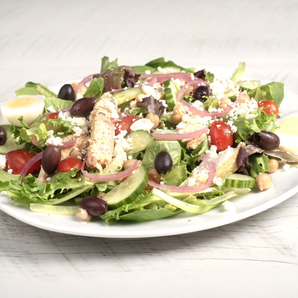 Mediterranean protein salad with fresh ingredients at Rooted Cafe Austin